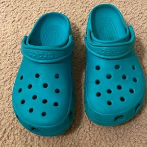 Teal crocs